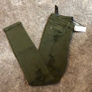 Distressed Army green pants by Bebe